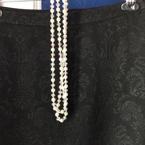 Ann Taylor gorgeous black skirt With regal print